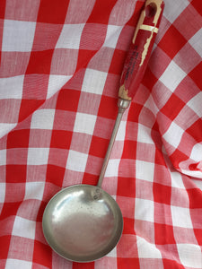 Ladle with advertising