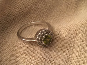 Green amethyst and cubic zirconia ring