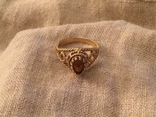 Chocolate garnet and gold ring