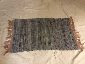 Woven throw rug
